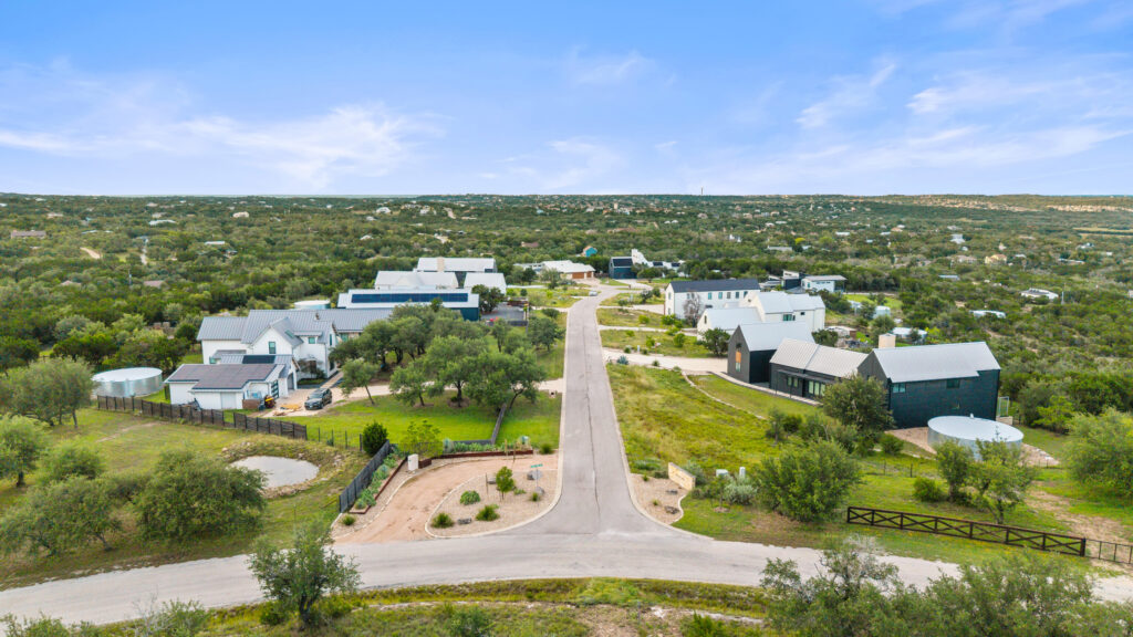 Available homesites in TerraLoma, a Hill Country community in Dripping Springs, Texas featuring 1 to 1.43-acre lots with mature trees, scenic views, and custom home building opportunities