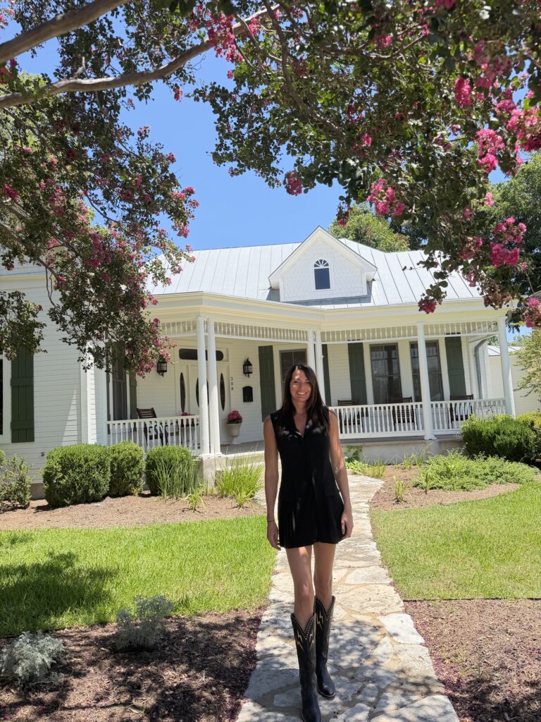 Dripping Springs Realtor Jenny Cureton showcasing a luxury Hill Country home in Dripping Springs, Texas.